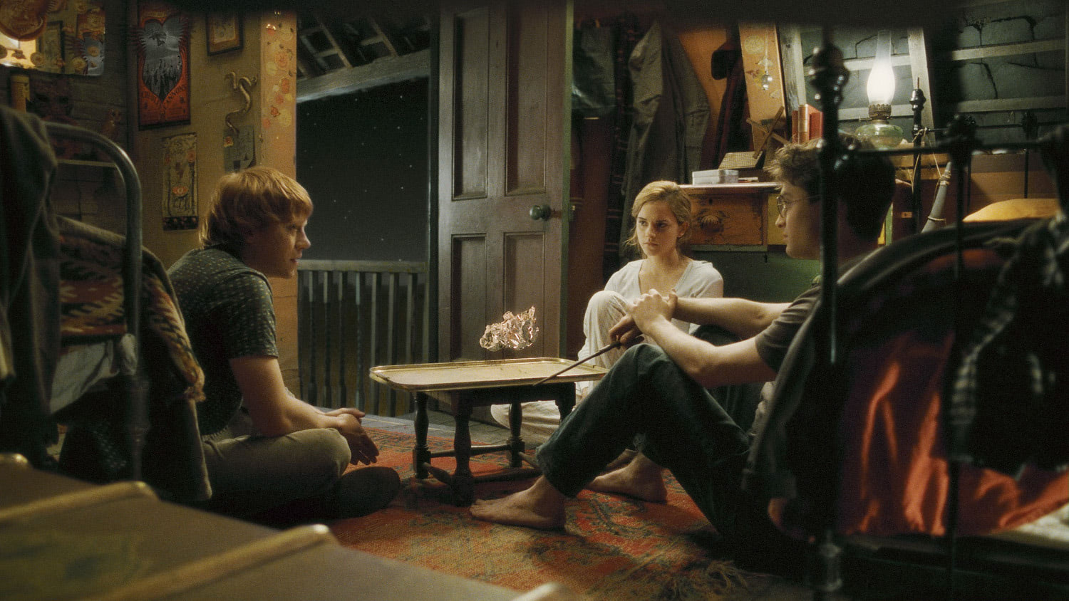 Ron, Hermione and Harry talking at The Burrow