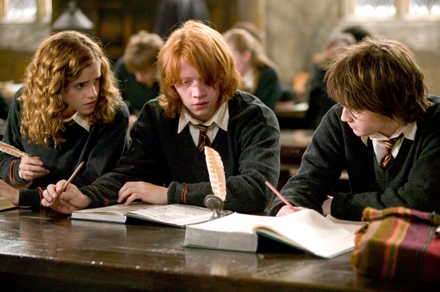 Hermione, Ron and Harry in the Great Hall
