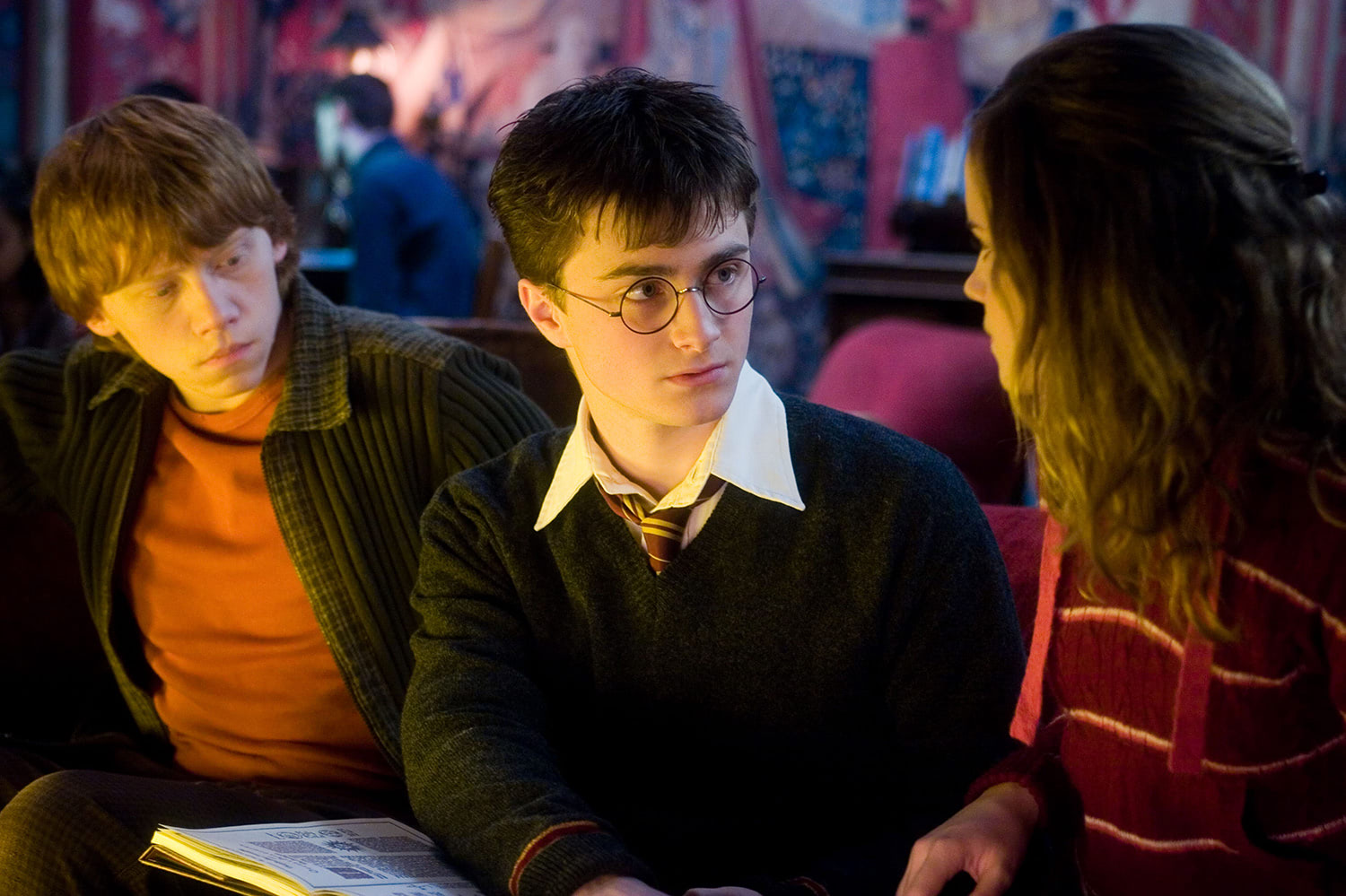Ron, Harry and Hermione in the Gryffindor Common Room