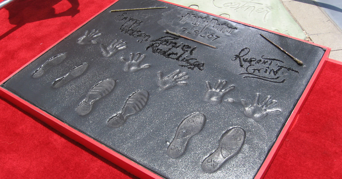 Dan, Rupert and Emma imprint their hands, feet and wand in Hollywood