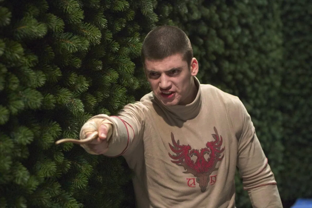 Viktor Krum with wand in the maze